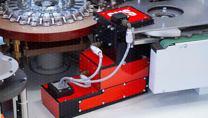 Quality Control Vision System for crown screw caps integrated into SACMI lining machines